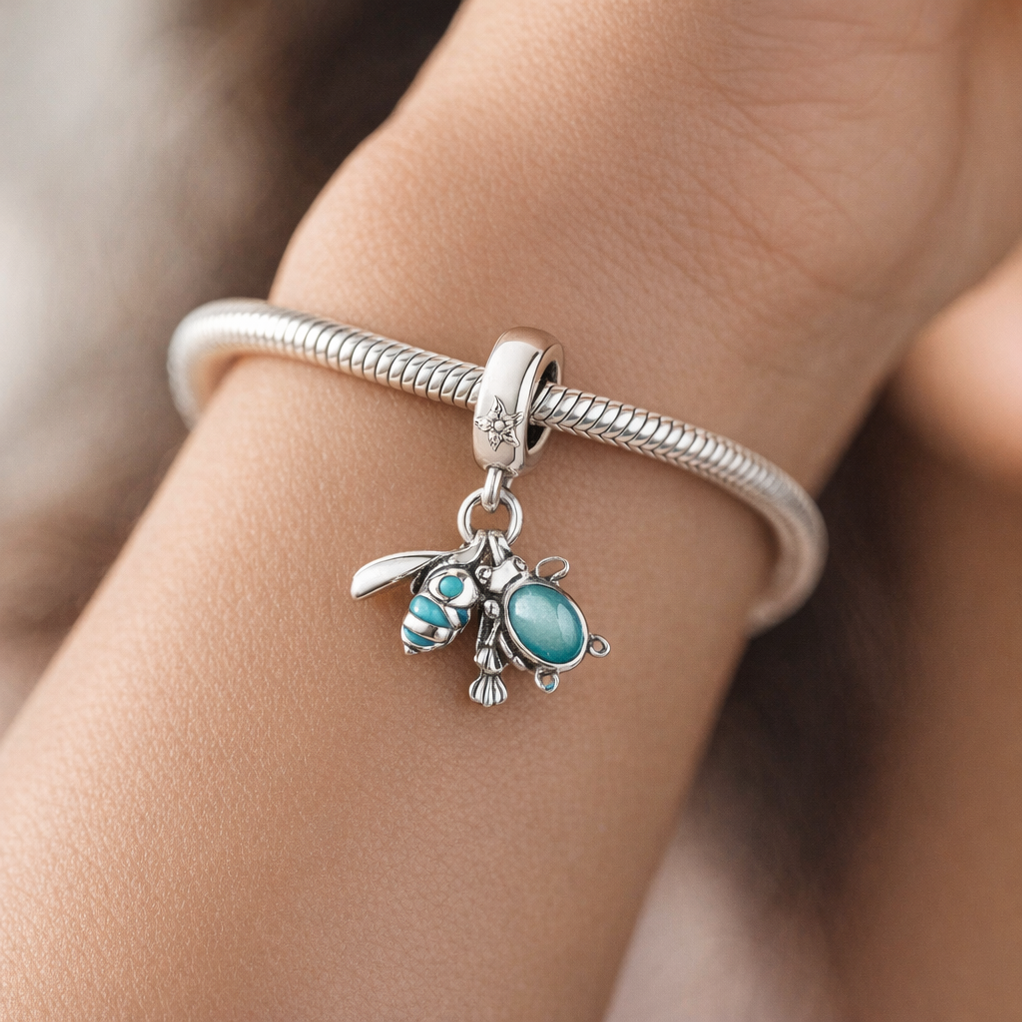 Fish, Sea Turtle & Conch Triple Dangle Charm — worn on wrist