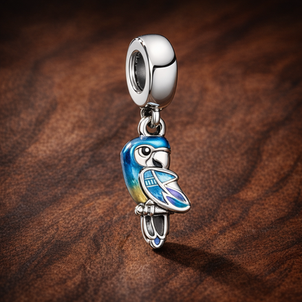 Colourful Parrot - Sterling Silver Colourful Enamel Parrot Dangle Charm — display on walnut