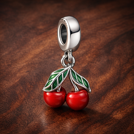 Asymmetrical Cherry Fruit Dangle Charm — display on walnut