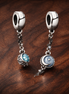 Tiny Blue Stone Stud Set Charm - Tiny Blue Stone Stud Set Charm — display on walnut