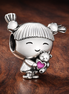 Little Girl Charm — display on walnut