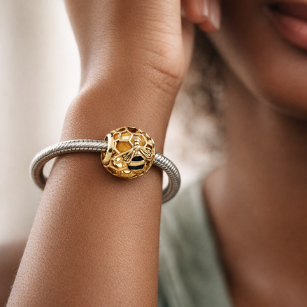 Gold Plated Honeycomb Heart Charm - Gold Plated Honeycomb Heart Charm — worn on wrist