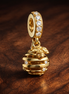 Gold Plated Beehive Dangle Charm - Gold Plated Beehive Dangle Charm — display on walnut