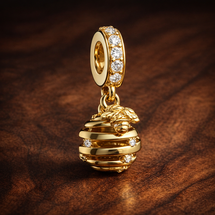 Gold Plated Beehive Dangle Charm - Gold Plated Beehive Dangle Charm — display on walnut