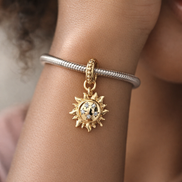 Gold Plated Sun Dangle Charm - Gold Plated Sun Dangle Charm — worn on wrist