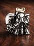 Silver Praying Angel Charm - Silver Praying Angel Charm — display on walnut