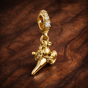 Gold Plated Fairy Dangle Charm - Gold Plated Fairy Dangle Charm — display on walnut