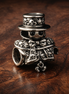Sparkling Snowman Charm - Sparkling Snowman Charm — display on walnut
