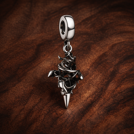 Baby Dragon - Sterling Silver Baby Dragon Dangle Charm — display on walnut
