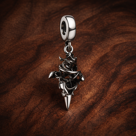 Baby Dragon - Sterling Silver Baby Dragon Dangle Charm — display on walnut