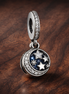 Moon & Blue Sky Dangle Charm — display on walnut
