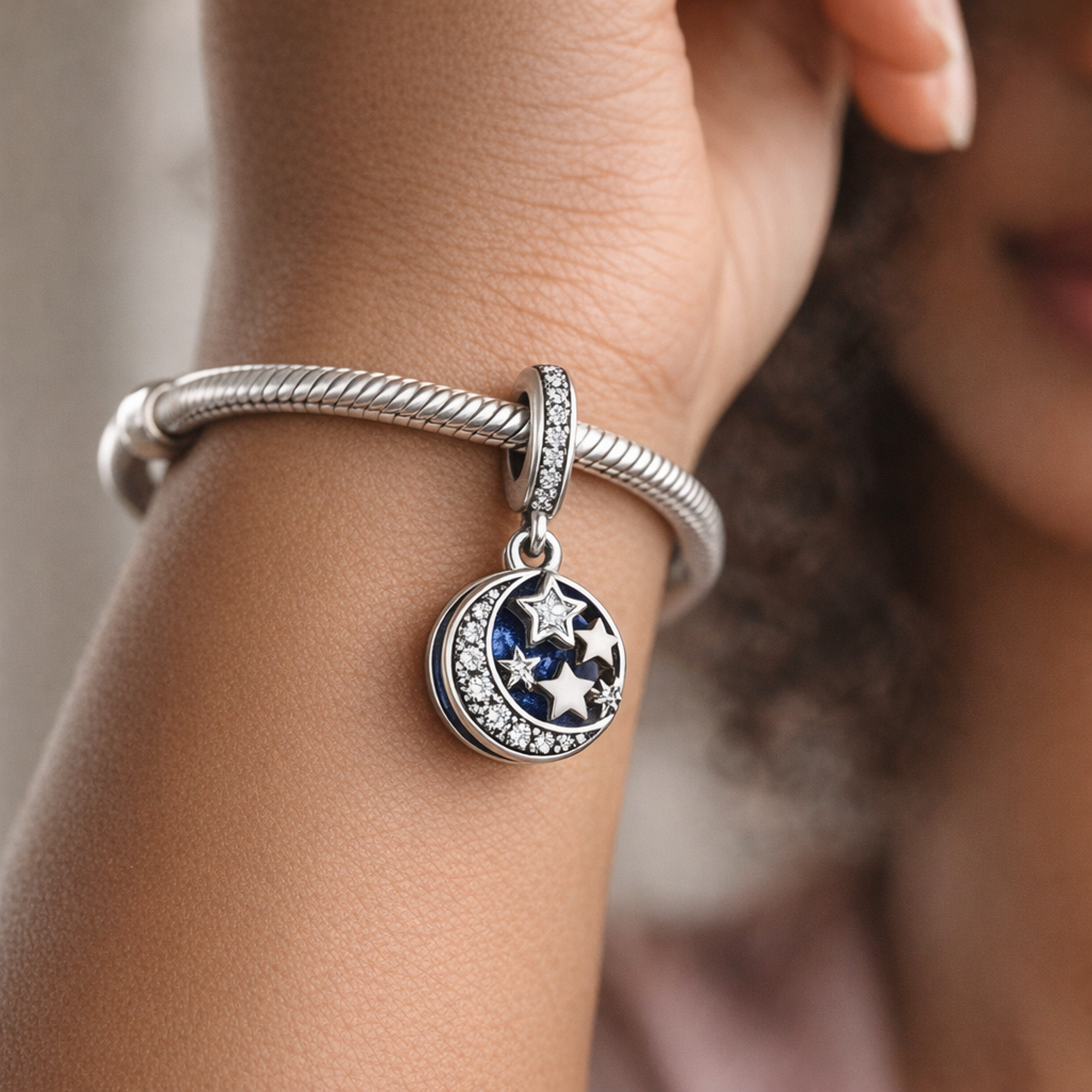 Moon & Blue Sky Dangle Charm — worn on wrist