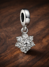 Floral Snowflake Stones - Sterling Silver Floral Snowflake Dangle Charm With Stones — display on walnut