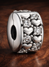 Infinite Hearts Sparkling Clip Charm — display on walnut