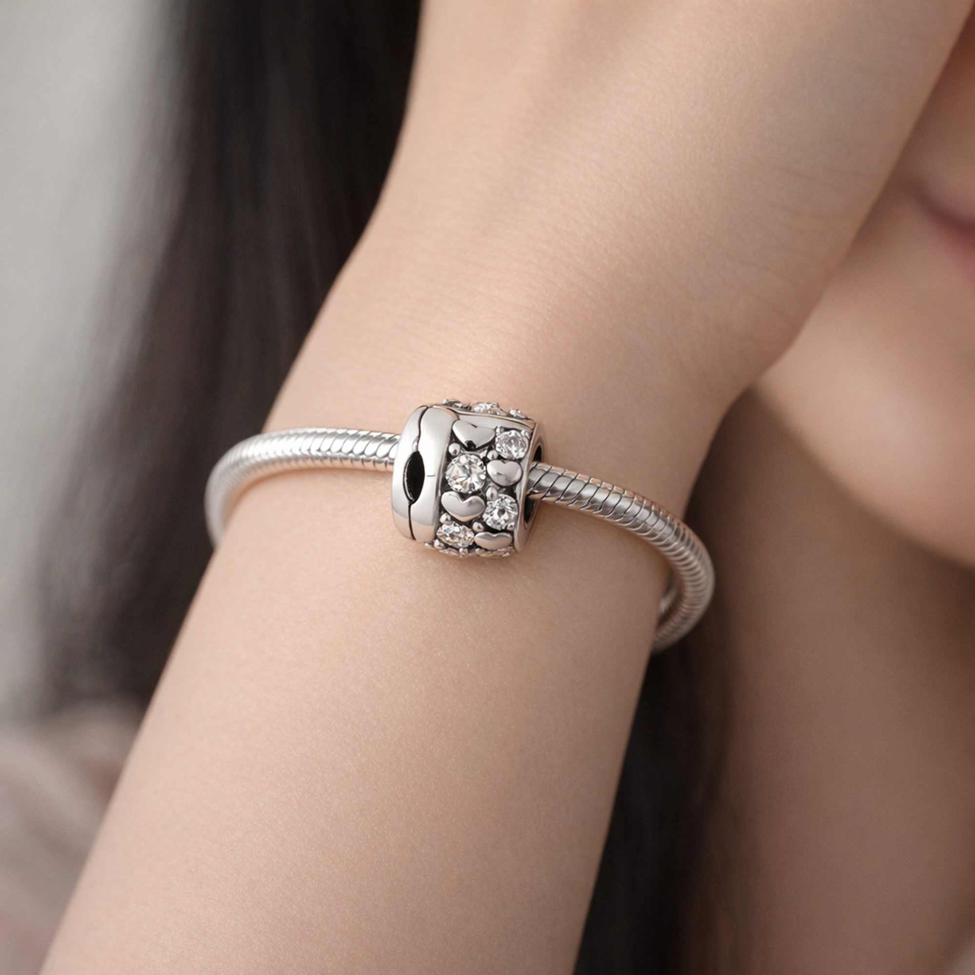 Infinite Hearts Sparkling Clip Charm — worn on wrist