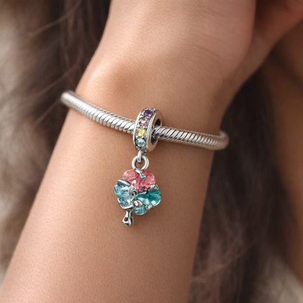 Rainbow Clover Dangle Charm - Rainbow Clover Dangle Charm — worn on wrist