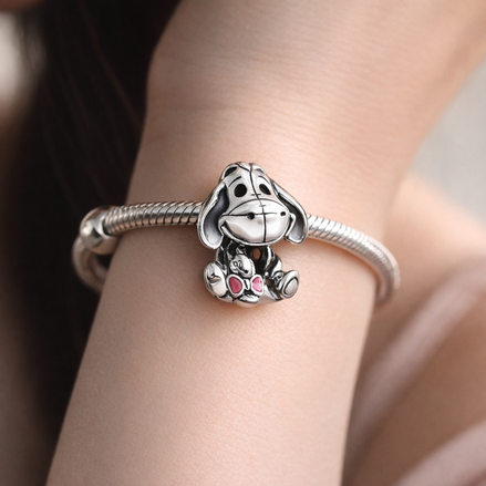Disney Winnie the Pooh Eeyore Charm — worn on wrist