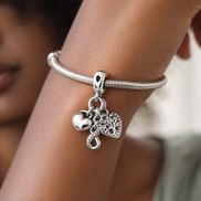 Family Infinity Triple Dangle Charm — worn on wrist