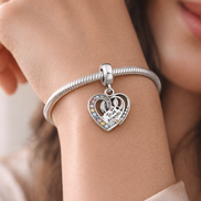 Puzzle Piece Hearts Splittable Friendship Dangle Charm — worn on wrist