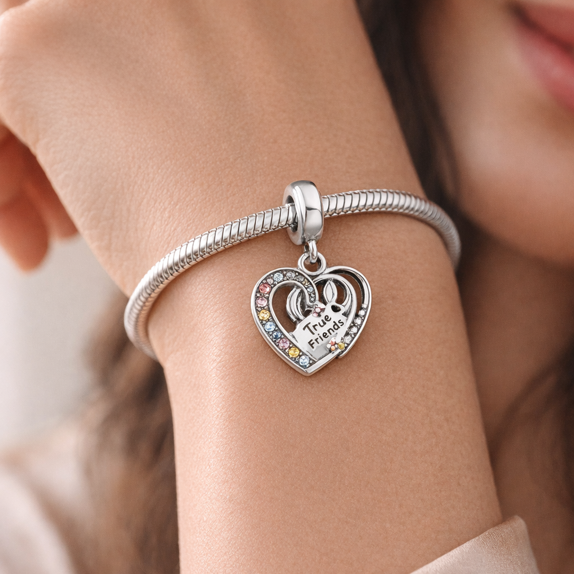 Puzzle Piece Hearts Splittable Friendship Dangle Charm — worn on wrist