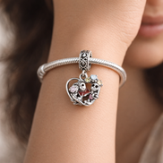 Disney Winnie the Pooh & Piglet Double Dangle Charm — worn on wrist