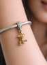 Disney Winnie the Pooh Tigger Dangle Charm — worn on wrist