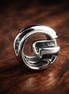 Letter G Alphabet Charm — display on walnut