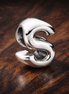 Letter S Alphabet Charm — display on walnut