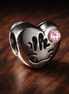 Pink Smile Bead - Pink Smile Bead Charm — display on walnut