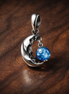 Blue Smile Bead - Blue Smile Bead Charm — display on walnut