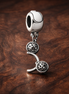 Black Mickey Balloons - Black Mickey Balloons Dangle Charm — display on walnut