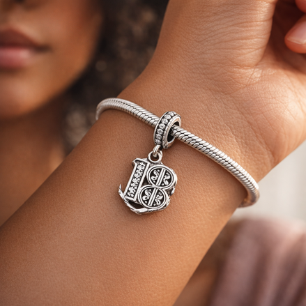 18th Celebration Dangle Charm — worn on wrist
