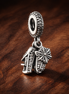 40th Celebration Dangle Charm — display on walnut