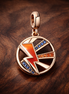 Rose Lightning Medallion - Rose Lightning Medallion Charm — display on walnut