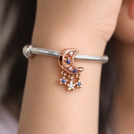 Star & Crescent Moon Charm — worn on wrist