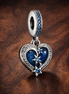 Celestial Shooting Star Heart Double Dangle Charm — display on walnut