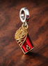 Two-tone Red Envelope Dangle Charm — display on walnut