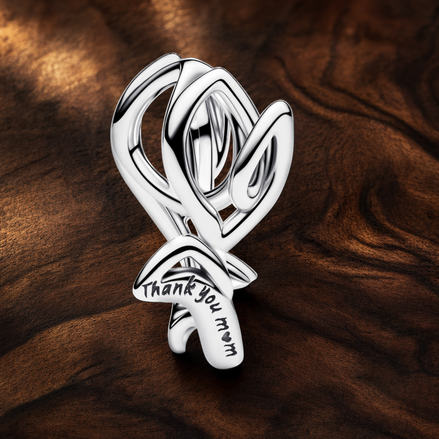 Running Donald Dangle - Running Donald Duck Dangle Charm — display on walnut