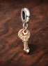 Rose Heart Key Dangle - Rose Heart Key Dangle Charm — display on walnut