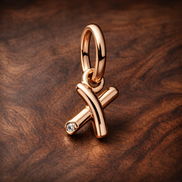 Letter X Script Alphabet Dangle Charm — display on walnut