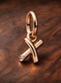Letter X Script Alphabet Dangle Charm — display on walnut