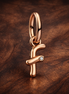 Letter F Script Alphabet Dangle Charm — display on walnut