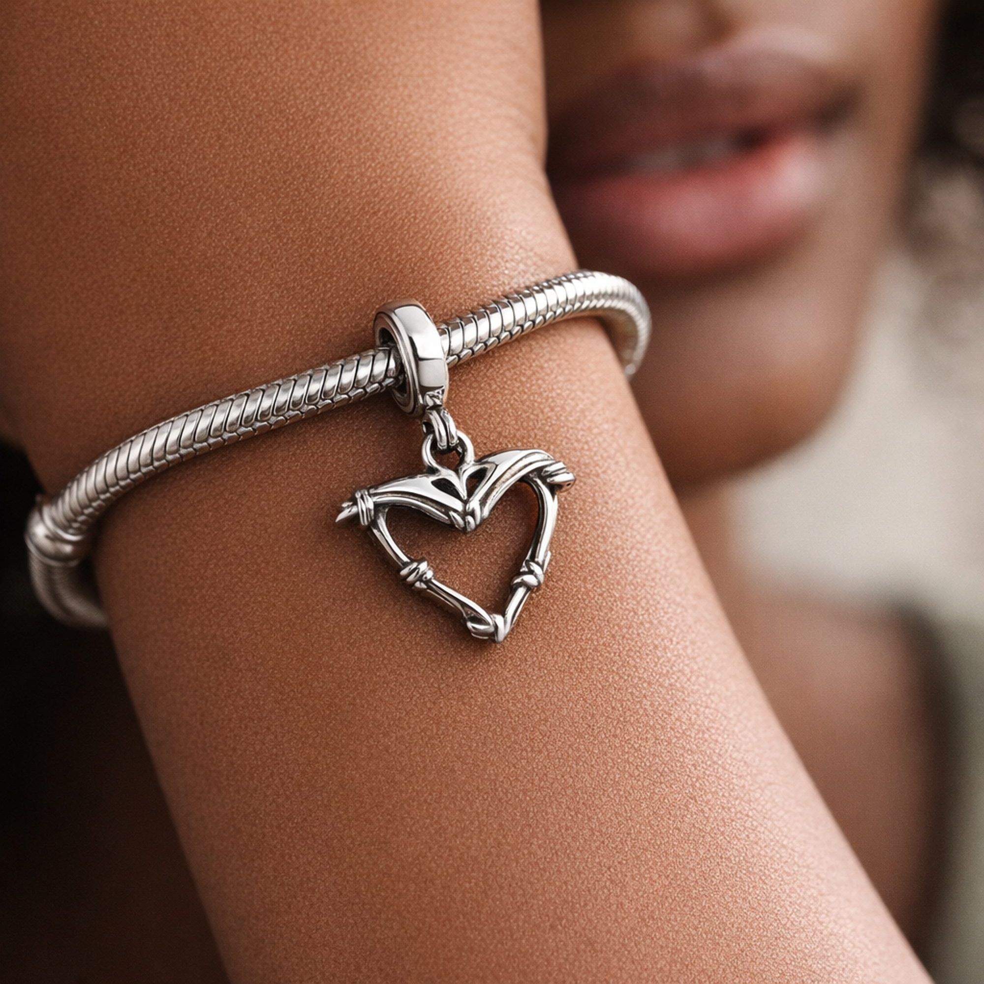 Wire Heart Medallion Charm — worn on wrist